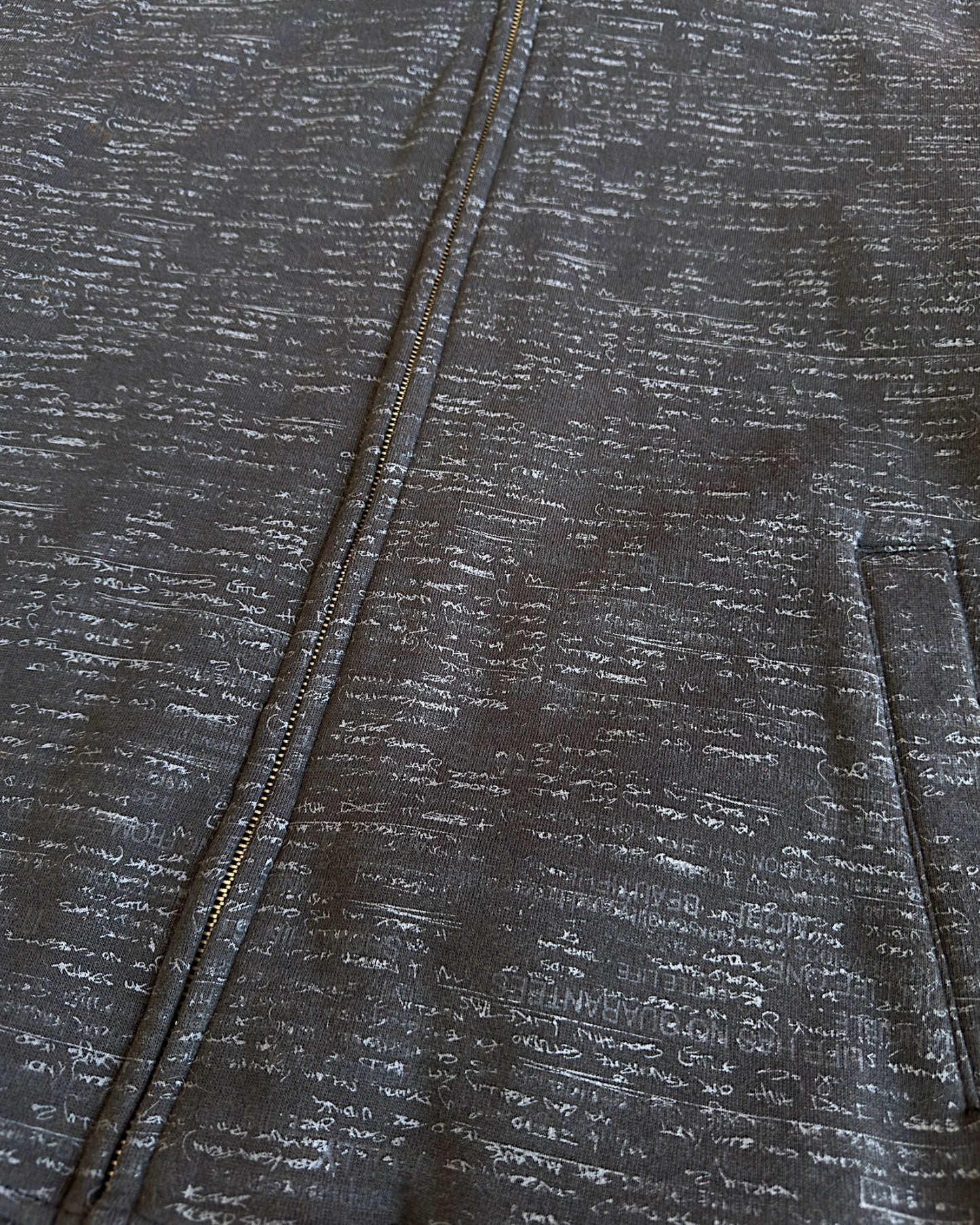 Defective Struct Fur Hood All-Over Script Print Zip Sweatshirt