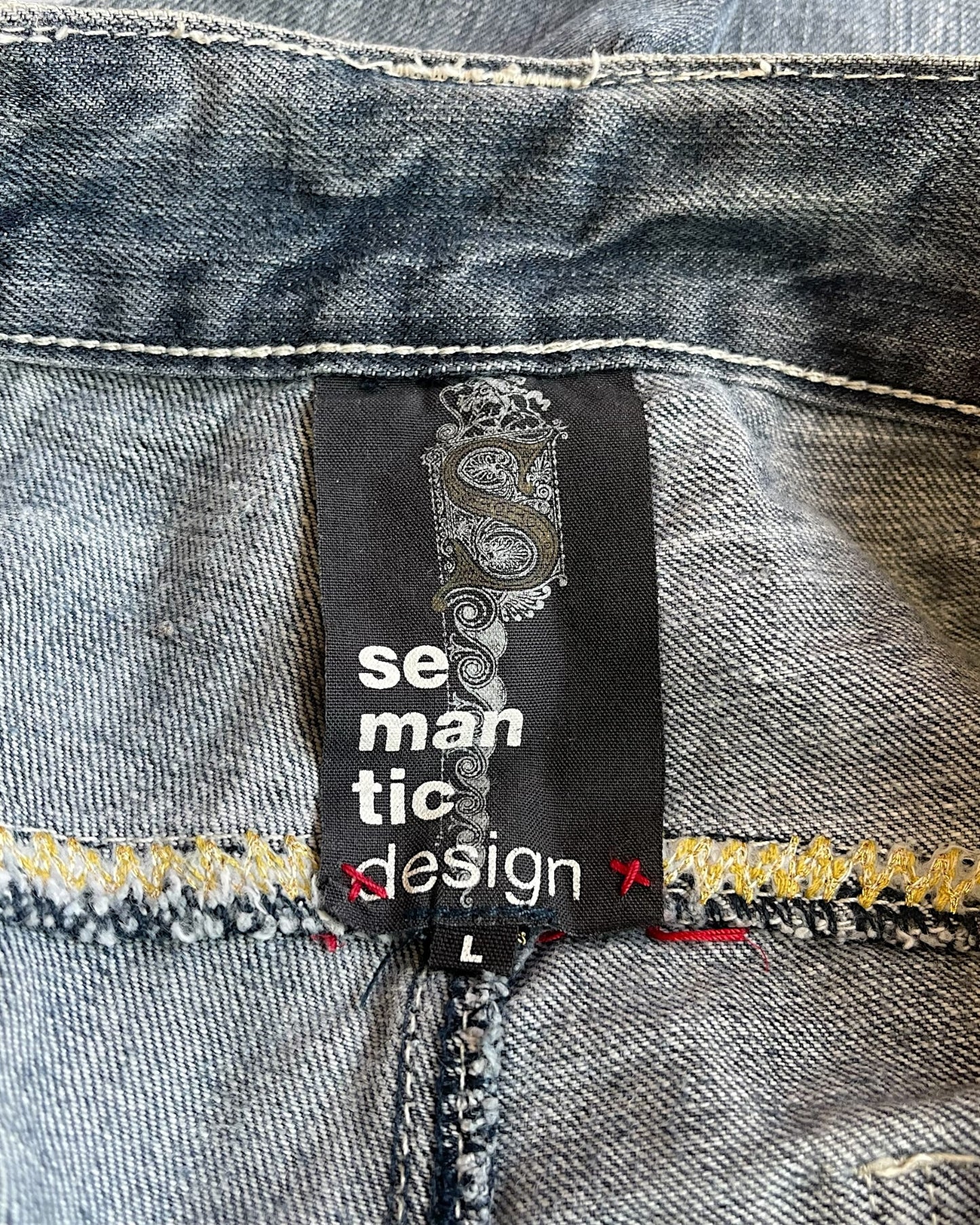 Semantic Design Python Double Pocket Sword Knee Flare Denim Jeans