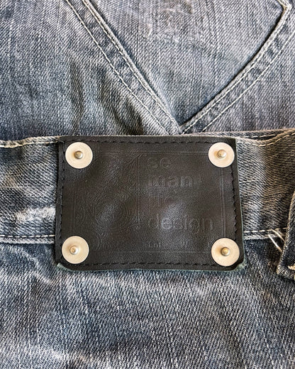 Semantic Design Python Double Pocket Sword Knee Flare Denim Jeans
