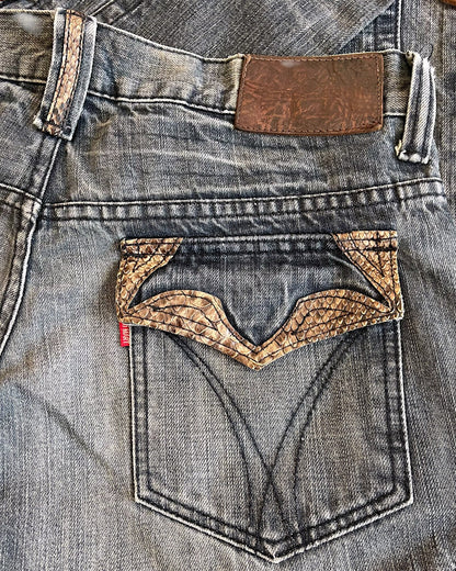 Tornado Mart Snakeskin Trim Side Lace-Up Panel Flare Denim Jeans