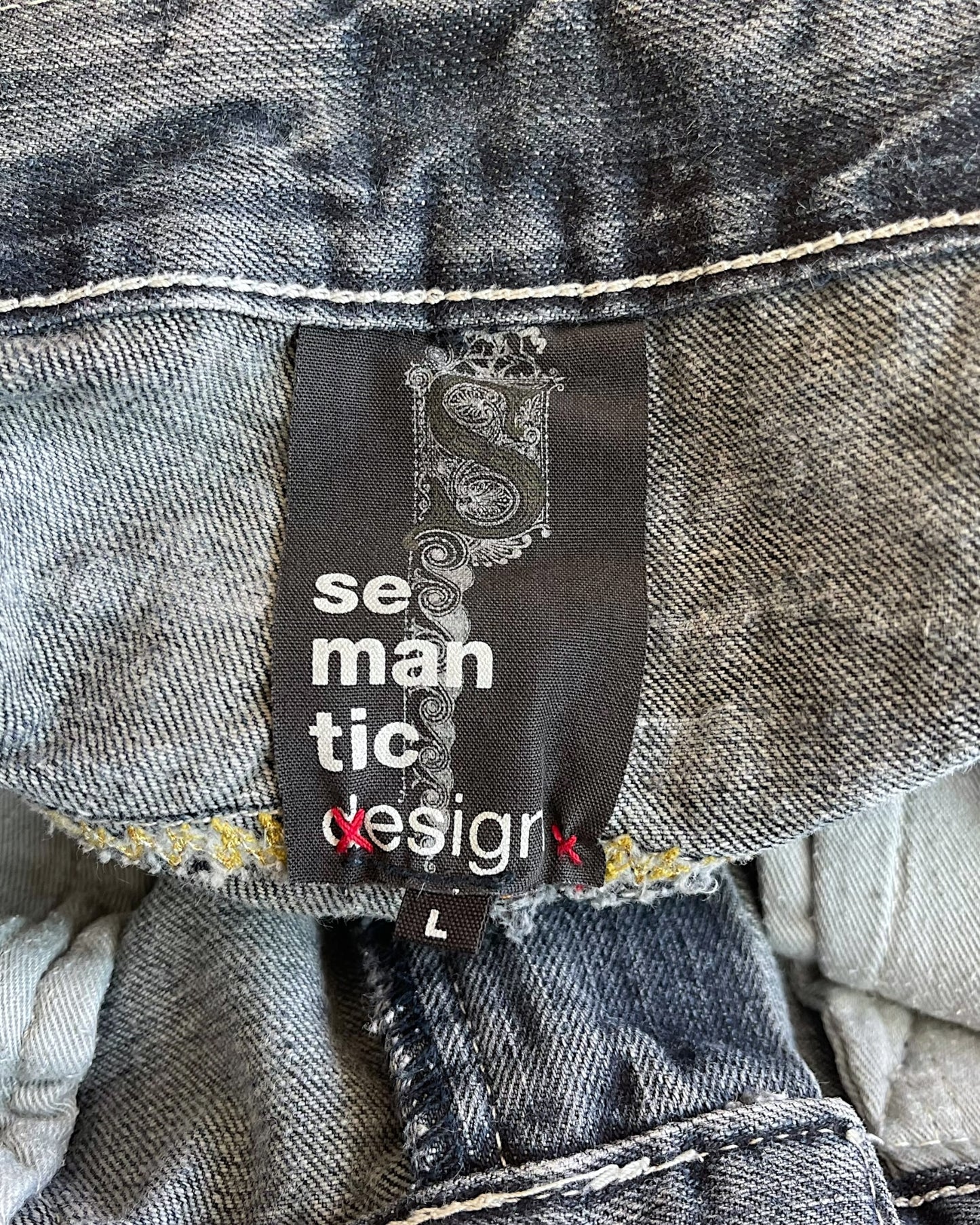 Semantic Design Python Pocket Sword Flare Distressed Denim Jeans